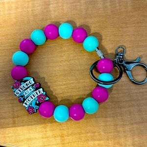 Strong as a mother wristlet